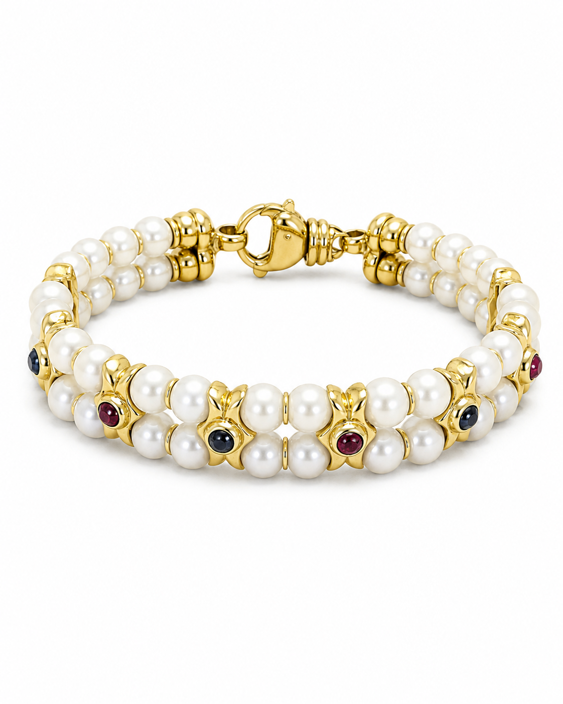 Pulsera años 80 de oro 18k, perlas, rubíes y zafiros