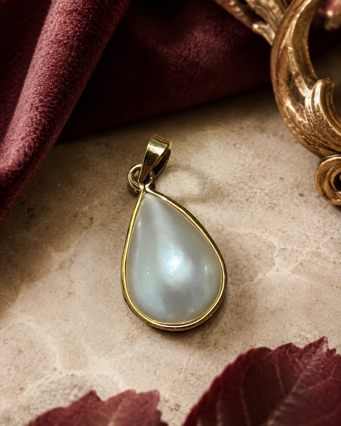 Colgante de oro 18k y perla mabé