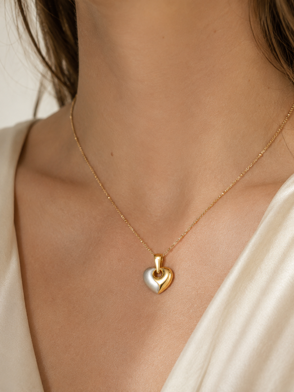 Colgante corazón oro bicolor 18k