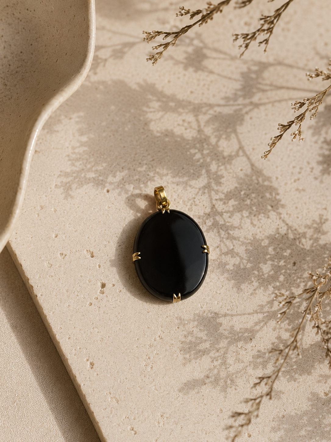 Colgante oro 18k y ónix negro