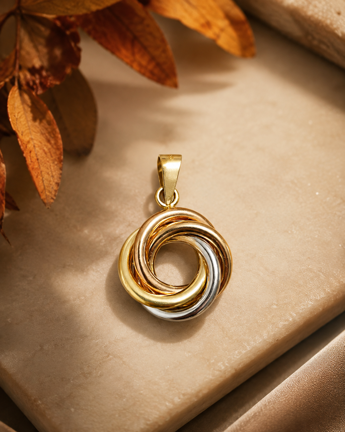 Colgante espiral oro 18k tricolor
