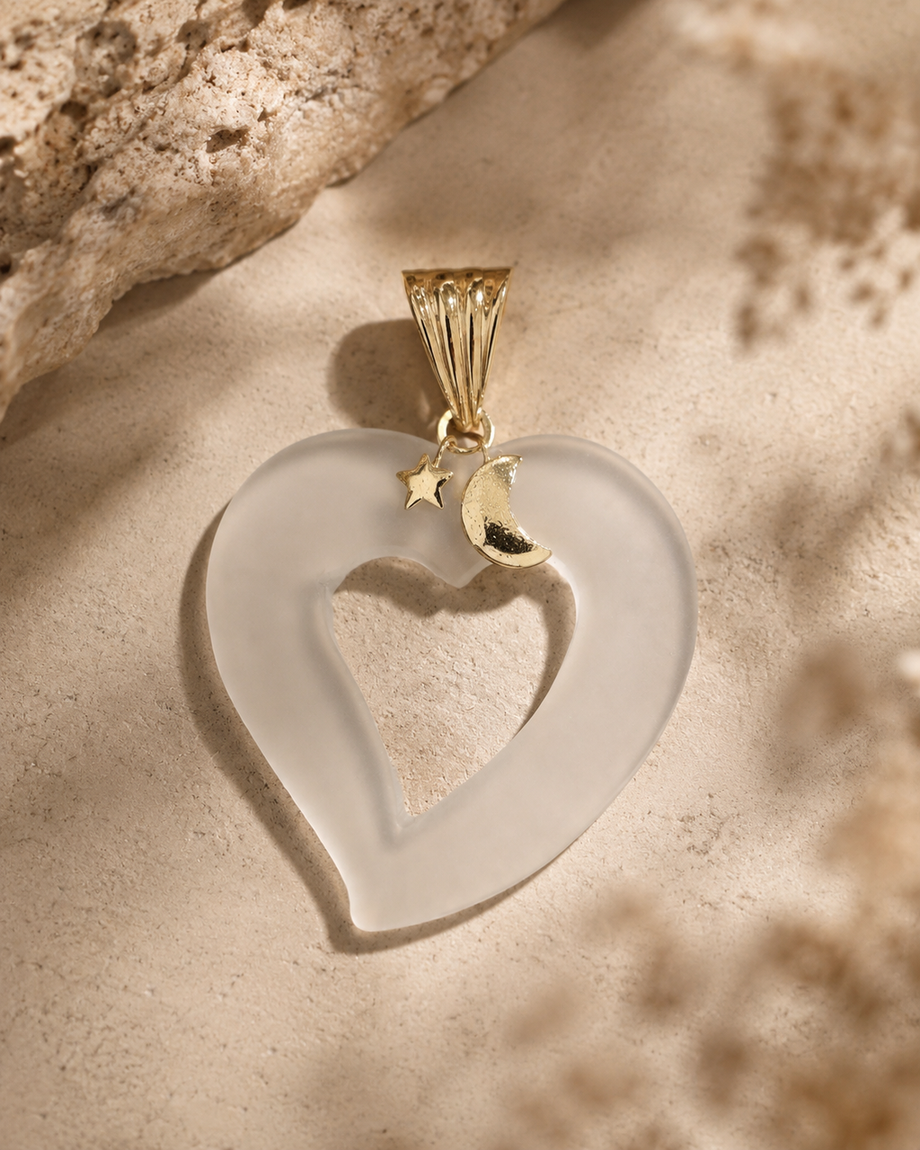 Colgante corazón oro 18k y cristal de roca