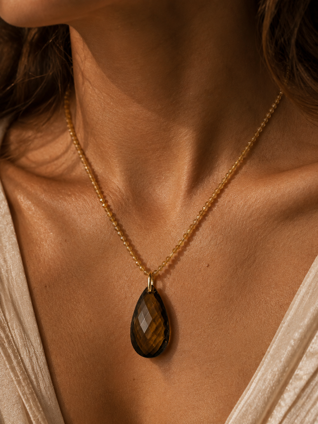 Colgante oro 18k con cuarzo fumé