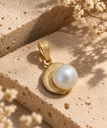 Colgante de oro 18k y perla