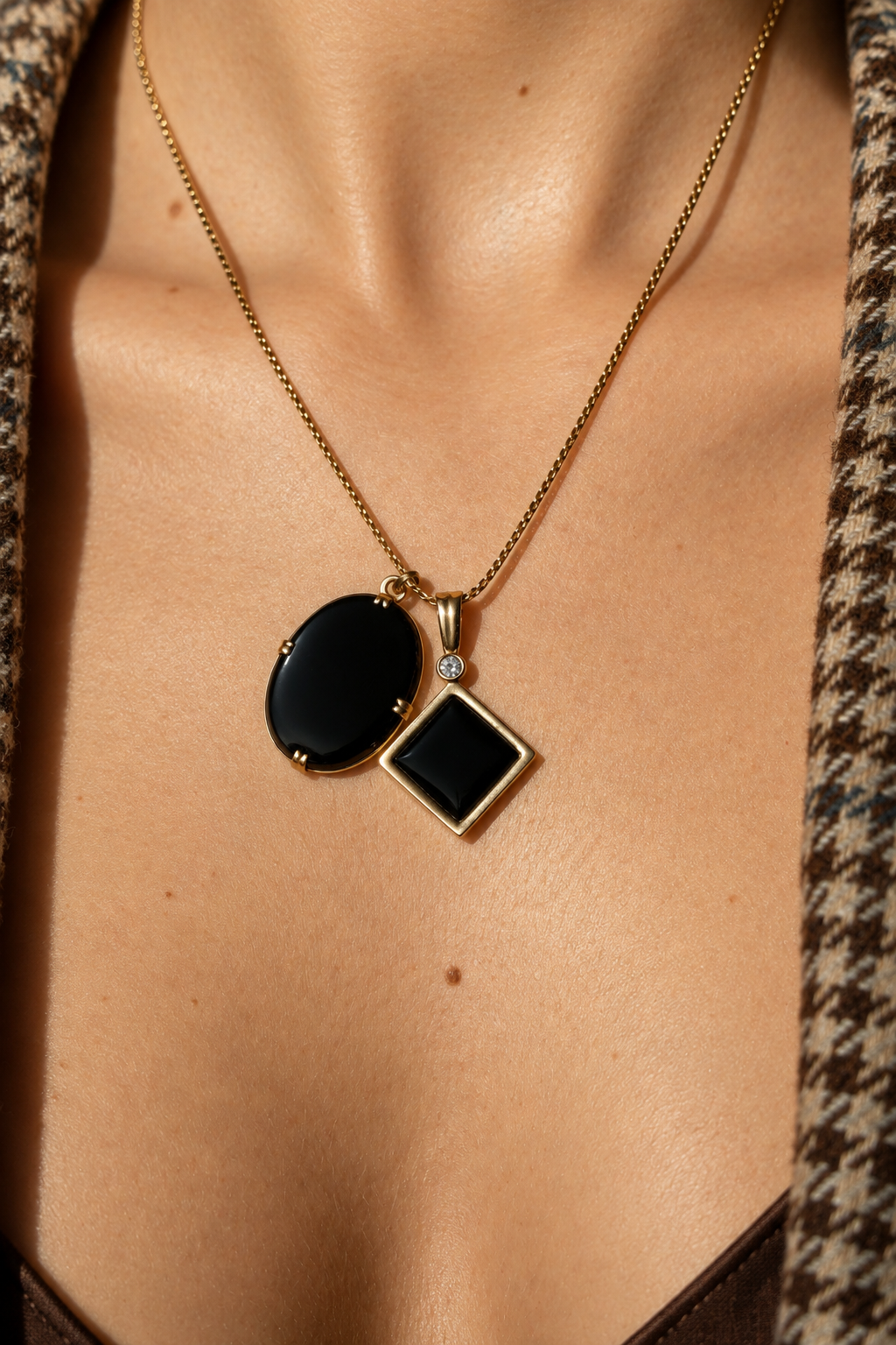 Colgante oro 18k, ónix y diamante central