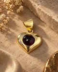 Colgante de oro 18k y cabujón de granate
